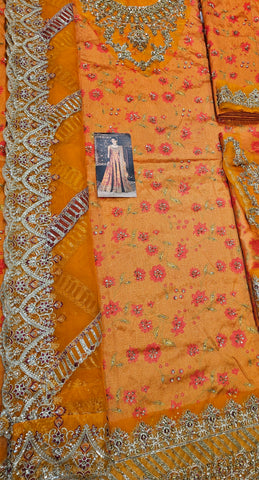 Kanwal Malik Wedding Edition 2026 orange rust frawk