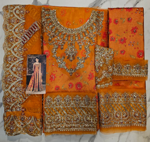 Kanwal Malik Wedding Edition 2026 orange rust frawk